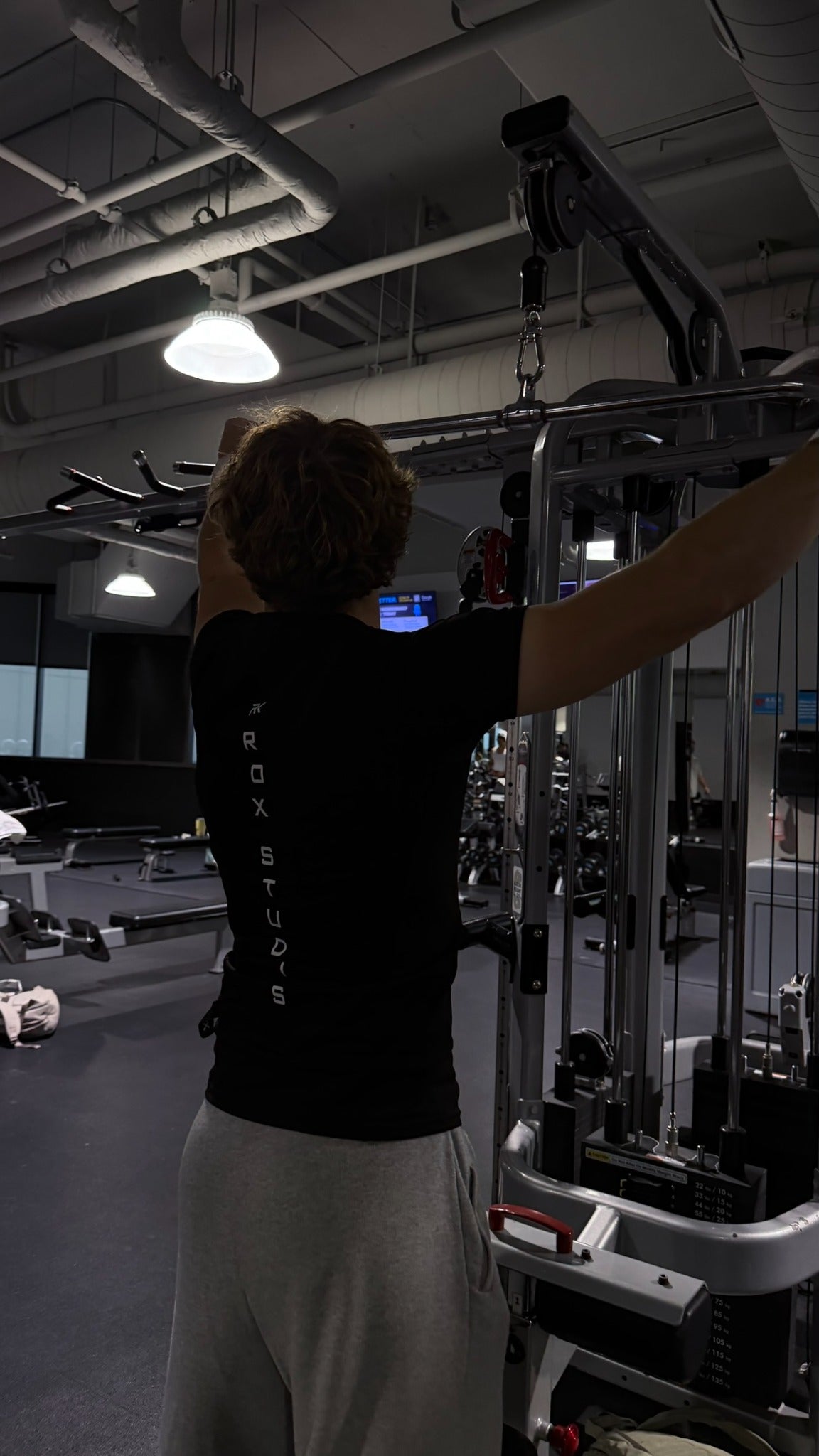 ROX Studios compression shirt in the gym
